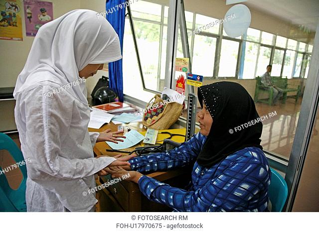 woman women indonesia government health clinic