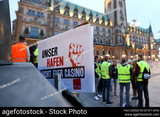 19 September 2023, Hamburg: After a demonstration against the sale of HHLA shares, a sign with the inscription ÒOur Port - Not Your CasinoÓ stands at the...