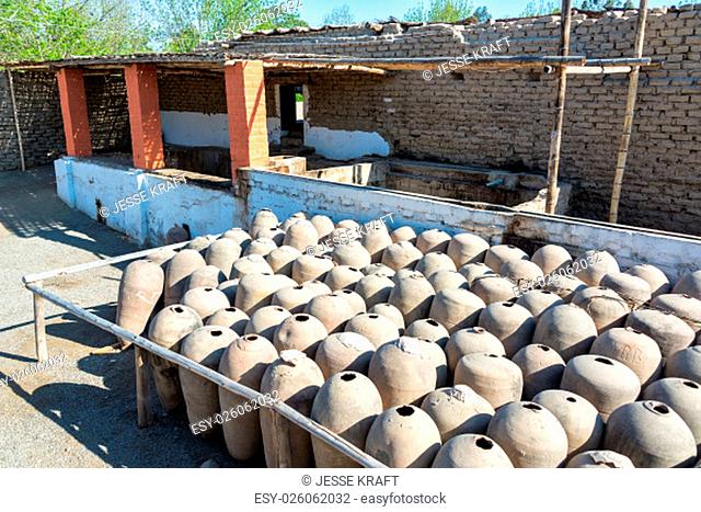 Large clay jars used in the production of pisco in Ica, Peru