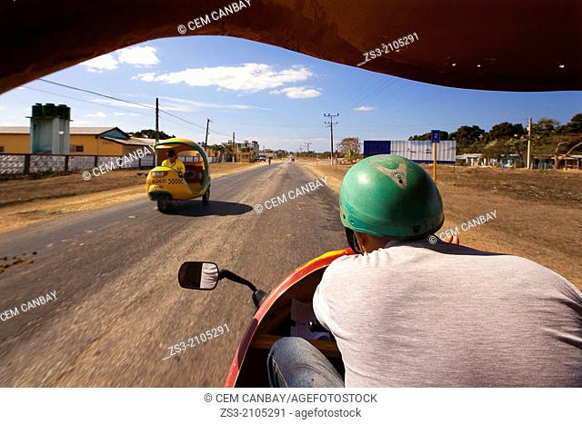 Coco Taxi driving at Peninsula Ancon; Trinidad, Sancti Sp’ritu Province, Cuba, West Indies, Central America