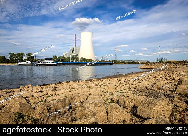 Rheinberg, Duisburg, North Rhine-Westphalia, Germany - Dry, stony riverbed in the Rhine with STEAG coal-fired power plant Walsum at the ferry pier Orsoy
