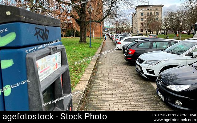 12 December 2023, Saxony-Anhalt, Magdeburg: A parking ticket machine at a parking lot. Due to a record budget deficit, the state capital has decided on...