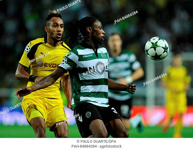 Pierre-Emerick Aubameyang, left, of Borussia Dortmund in action against Ruben Semedo of Sporting Lisbon during the UEFA Champions League Group F soccer match...