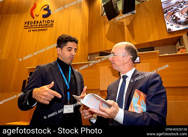 DGDE Solayman Laqdim and Federation Wallonia - Brussels parliament Chairman Rudy Demotte pictured as the general delegate for child rights (DGDE) submits his...
