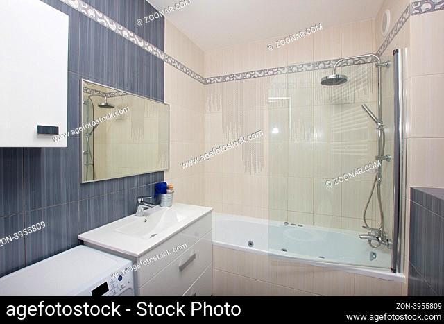 Moder bathroom in gray and white tiles
