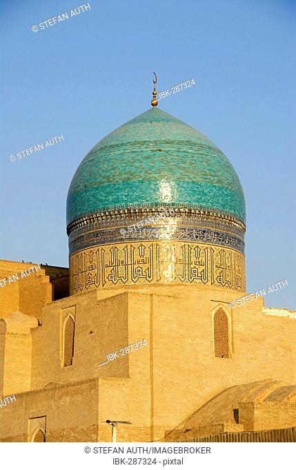 Cupola decorated with blue glazed tiles of Mosque Kalon Bukhara Uzbekistan