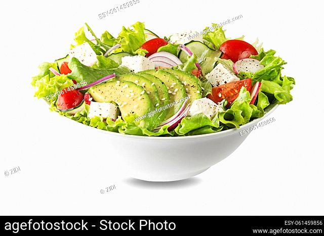 Healthy green salad with avocado feta cheese and fresh vegetables isolated on white