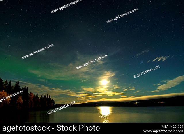 Sweden, Norrbotten County, rest area at Stora Lulevatten, Porjus, moonlight, subtle aurora borealis
