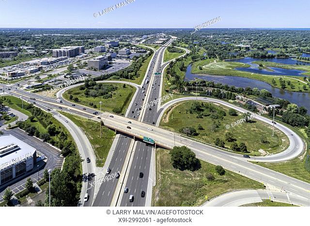 Aerial view of a highways, overpasses, ramps and buildings in the Chicago suburban area of Northbrook, IL. USA