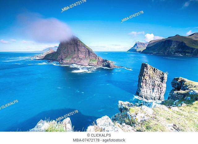 The sea stacks of Drangarnir and Tindholmur islet, Vagar Island, Faroe Islands