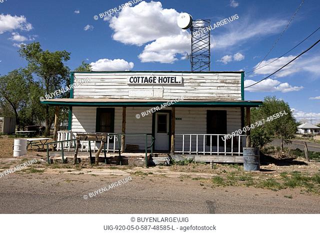 Truly shacking up in a real shack of a clapboard Motel with peeling paint and dilapidation