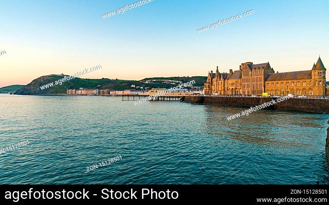 Aberystwyth, Ceredigion, Wales, UK - May 25, 2017: Evening view over the Marine Terrace with Yr Hen Goleg (Aberystwyth University Old College) on the right