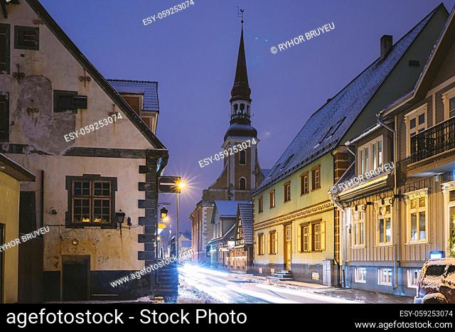 Parnu, Estonia. Night View Of Kuninga Street With Old Houses, Restaurants, Cafe, Hotels And Shops In Evening Night Illuminations