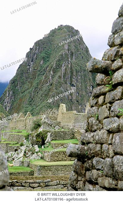 An Inca site, located on a mountain ridge at 7, 970 ft, is known as the Lost City of the Incas with terraced stone walls and cliffs around them