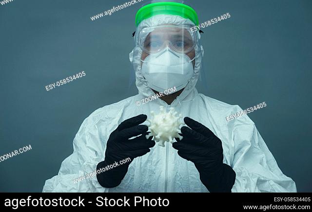 Covid19, Nurse with protective face mask, glasses and sanitary mask. coronavirus and treatment concept on gray and neutral background