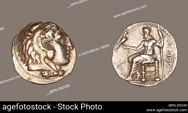 Author: Ancient Greek. Tetradrachm (Coin) Portraying Alexander the Great as Herakles - 323/317 BC - Greek, minted in Sidon. Silver. 323 BC'317 BC