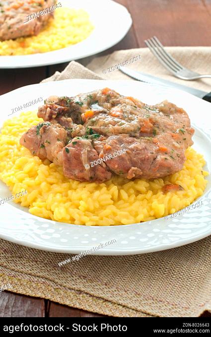 marrowbone, veal cut used in Italian cooking with yellow risotto alla milanese with safran