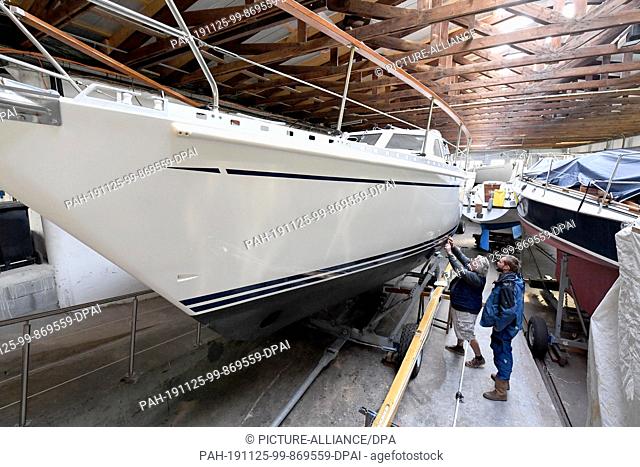 22 November 2019, Schleswig-Holstein, Kiel: Yachts are standing on the premises of the boatyard Rathje. The almost 100 year old Kieler Jacht- und Bootswerft is...