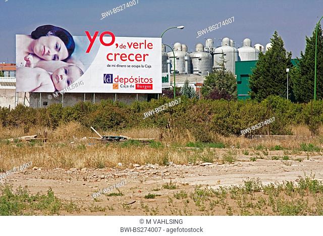 advertisement hoarding in front of an industrial area at the gates of the town, Spain, Kastilien und Len, Burgos
