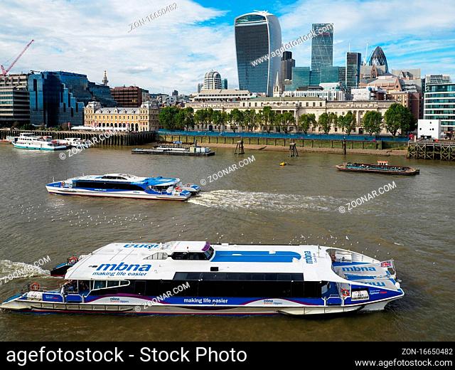 River Buses Cruising along the River Thames