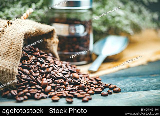 coffee beans, bag with scoop and jar of coffee beans. modern vintage style