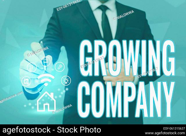 Hand writing sign Growing Company. Conceptual photo generates significant positive cash flows or earnings Man holding Screen Of Mobile Phone Showing The...