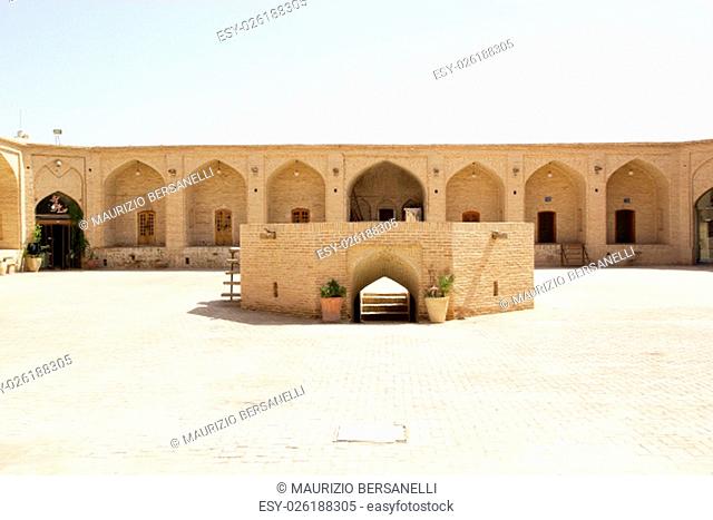 Historic caravanserai at Meybod, Iran. A caravanserai was a roadside inn where travelers could rest and recover from the day journay