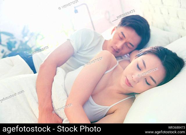 The young couple in bed