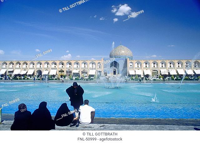Tourists in front of mosque, Sheikh Lotfollah Mosque, Meydan-e Imam, Isfahan, Iran