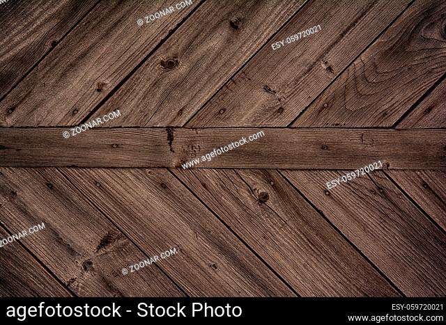 Dark brown wooden background. Old vintage surface