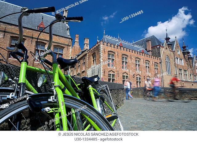 Bicycle in a typical street in the medieval town of Brugge, listed World Heritage Site by UNESCO  Flanders  Belgium