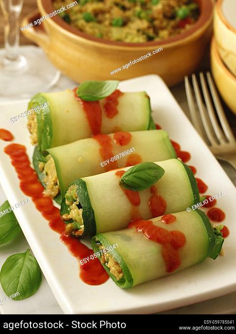 Rolls of zucchini filled with couscous and vegetables