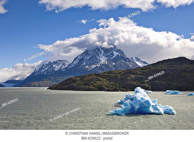 Icebergs and mountain peaks of the Torres del Paine Grande, seen from the Lago Grey, Torres del Paine National Park, Patagonia, Chile, South America
