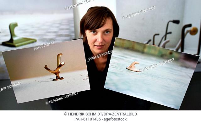 The Dutch artist Judy van Luyk prepares her photo work 'Haken' for the upcoming exhibition 'Lost&Found' in the Ampelhaus in Oranienbaum, Germany, 27 August 2015