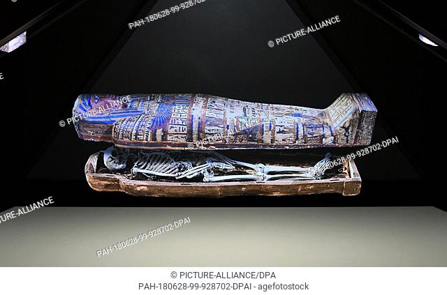 28 June 2018, Hildesheim, Germany: An animated hologram of the mummy Ta- cheru at the ""Ta-cheru, a journey inside the Mummy"" exhibition