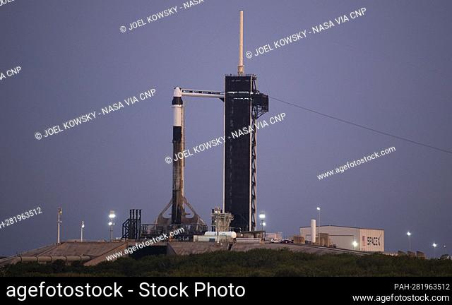 A SpaceX Falcon 9 rocket with the company's Crew Dragon spacecraft aboard is seen on the launch pad at Launch Complex 39A as preparations continue for Axiom...