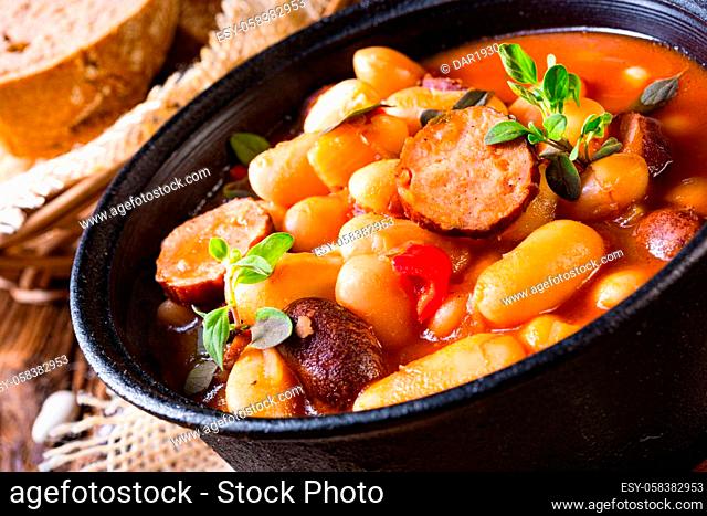 Delicious bean stew with sausage and potato