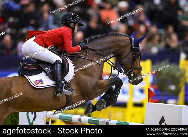 08 April 2022, Saxony, Leipzig: Allessanda Volpi from the USA competes on Berlinda in the Final II of the Longines Fei Jumping World Cup at the Leipzig Fair