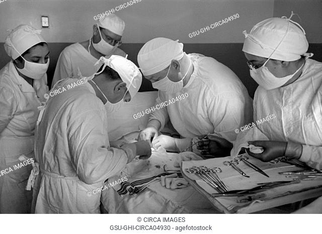 Surgeons Operating on Patient, Cairns General Hospital, FSA Farmworkers Community, Eleven Mile Corner, Arizona, USA, Russell Lee, Farm Security Administration