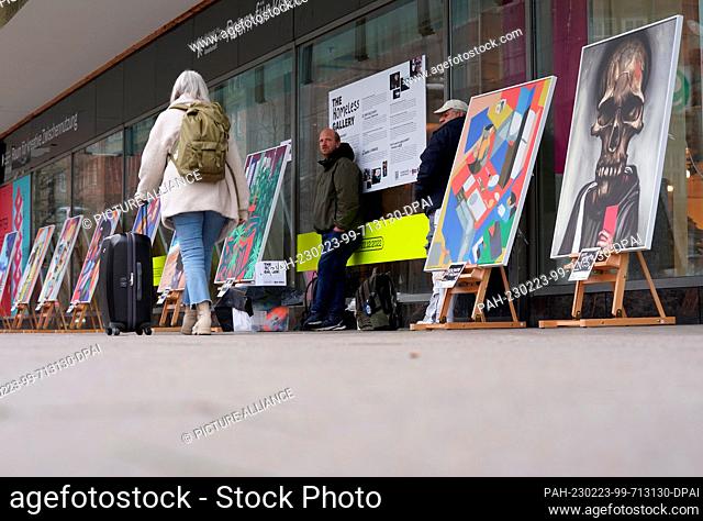 23 February 2023, Hamburg: Large-format paintings, painted with the help of artificial intelligence (AI), stand on easels in the pop-up exhibition ""Homeless...