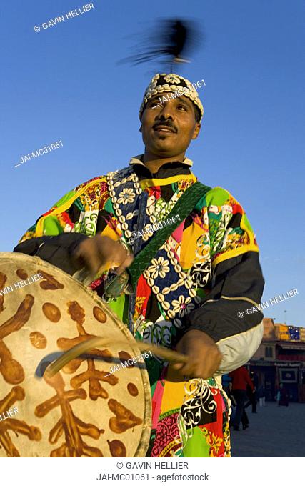 Street performer playing a drum, Djemaa el-Fna, Marrakesh, Morocco