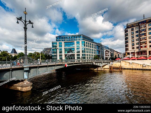 BERLIN, GERMANY - AUGUST 11: Friedrichstrasse Bridge Over the Spree River on August 11, 2013 in Berlin, Germany. The Friedrichstrasse is a major culture and...