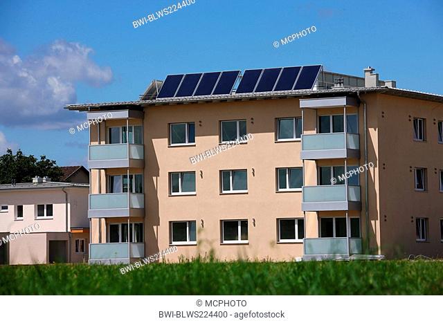 Multi-party house with solar collectors
