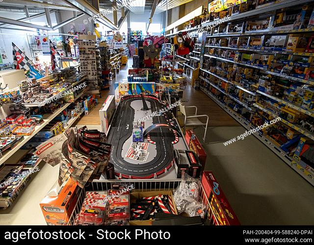 03 April 2020, Bavaria, Nuremberg: The premises and shelves in a toy store Schweiger are full and the store, like many other stores