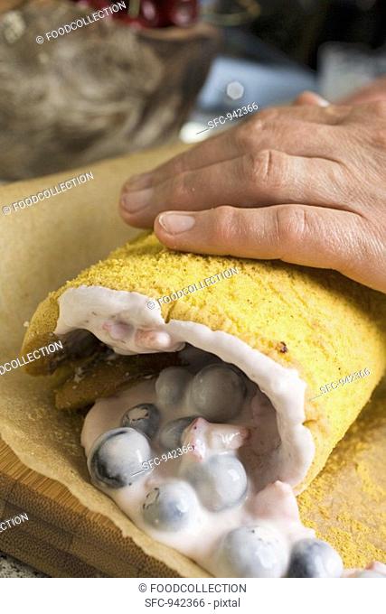 Rolling up a sponge roulade