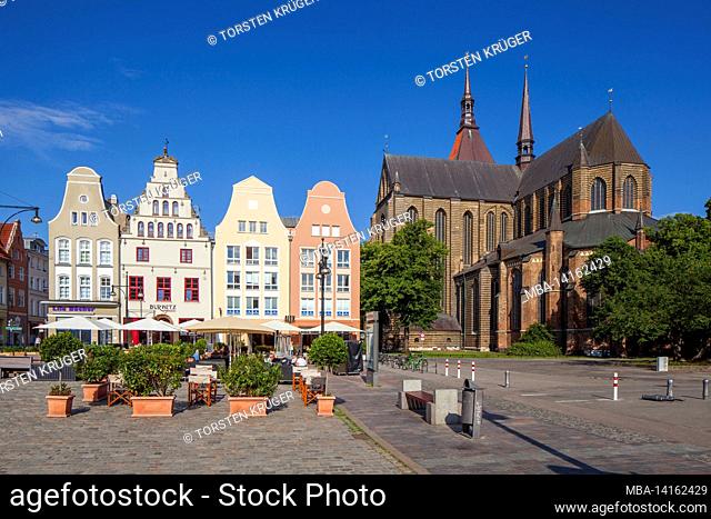 new market with historic gabled houses and sankt-marien-kirche, rostock, mecklenburg-western pomerania, germany, europe