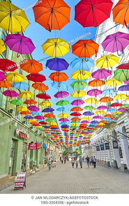 Street with colored umbrellas in Timisoara, Romania