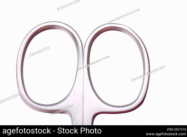 Macro view of handle of scissors isolated over white