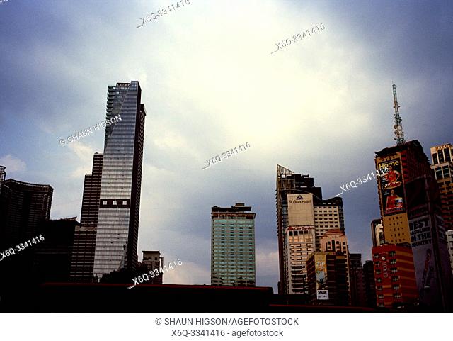 Manila skyline and Trump Tower in Makati in Manila in Luzon Metro Manila in the Philippines in Southeast Asia Far East