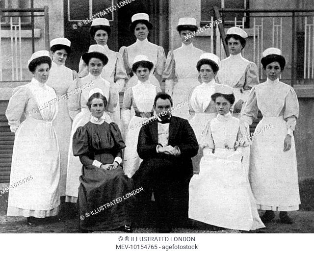 EDITH CAVELL (in dark uniform) with probationer nurses and a doctor at the Brussels Nursing School, which she founded